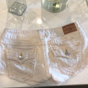 Try religion white shorts